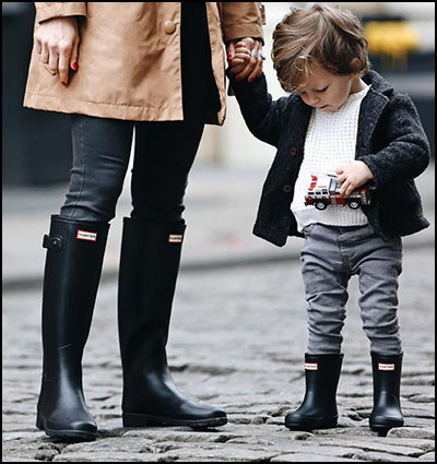 mom and her boy wearing hunter boots