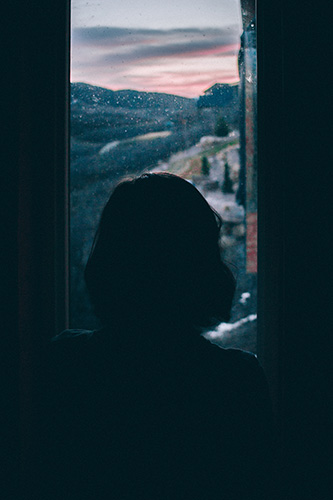 A woman looking outside