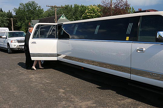White limos waiting for people