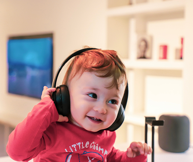 The little boy listening to music